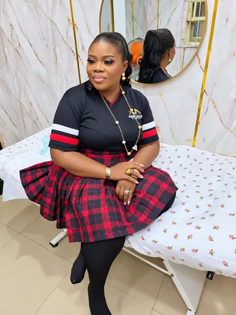 The CEO of Abigail's Nail Studio, seated in the studio