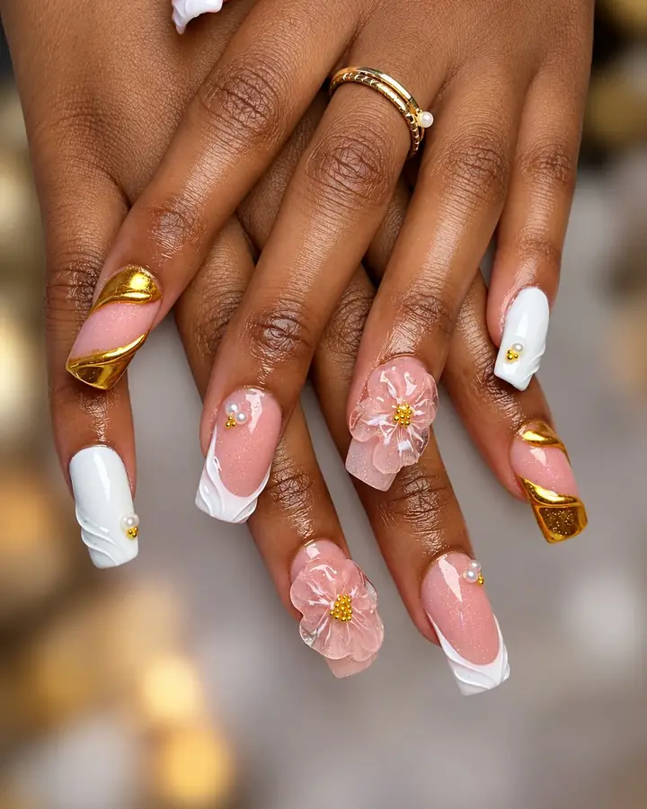 Pink nails with white French tips, 3D flowers and gold chrome