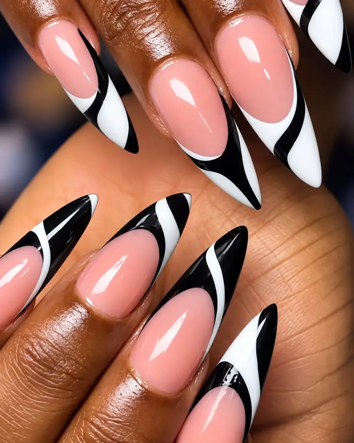 Black and white swirl French tips on stiletto nails