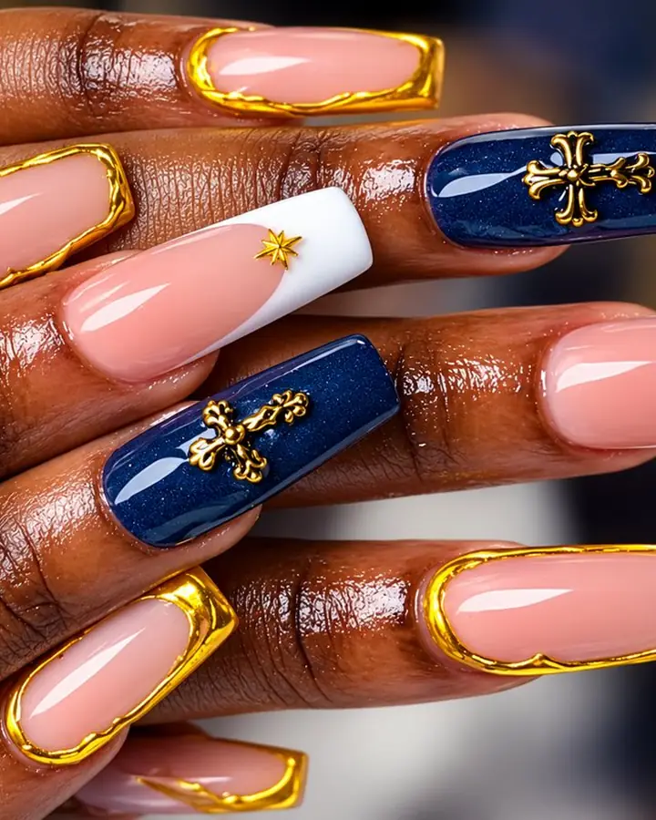 Navy blue and white nails with gold crosses and gold borders